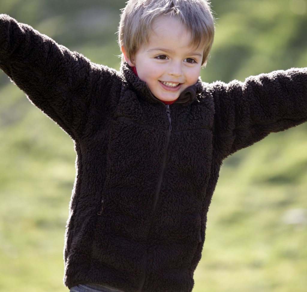 rsz_bigstock-young-boy-smiling-and-running-46512505